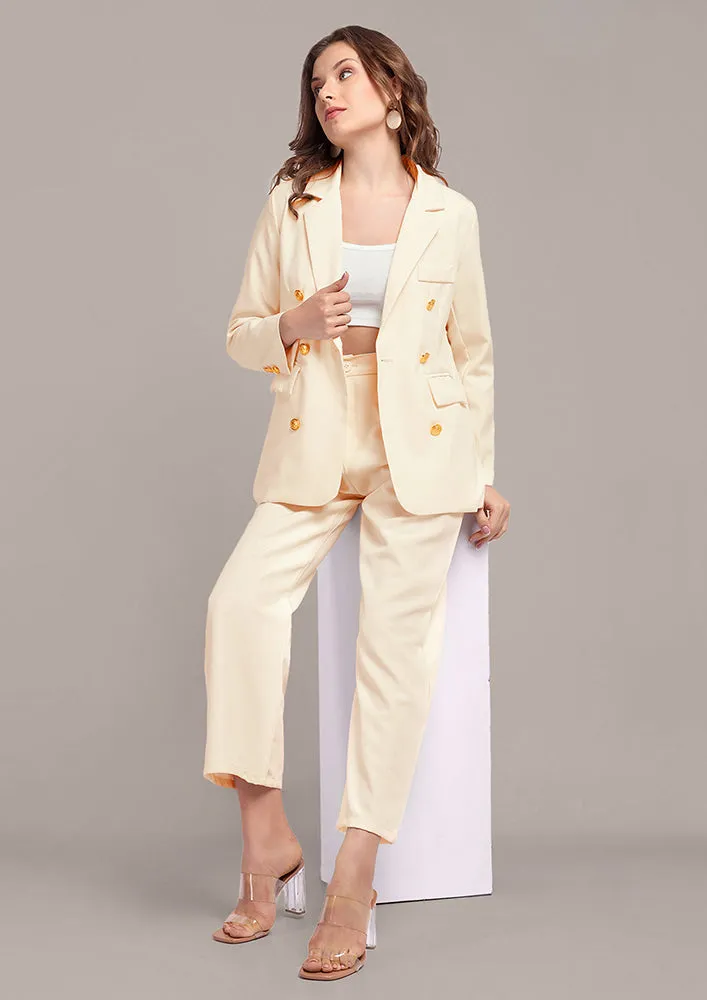 Oversized Off White blazer and pant set with golden buttons