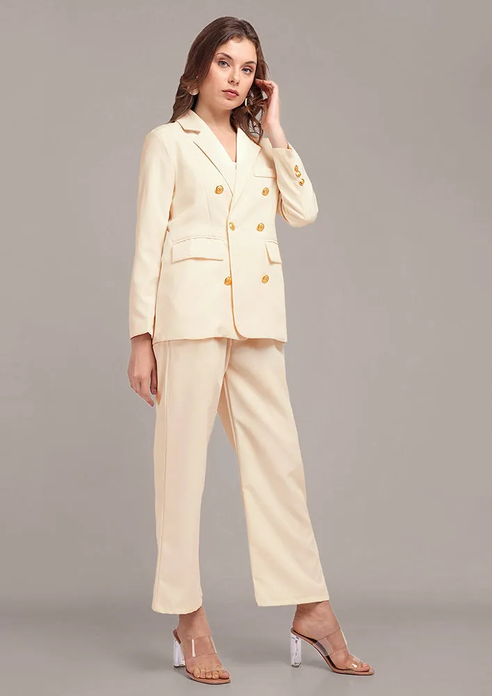 Oversized Off White blazer and pant set with golden buttons