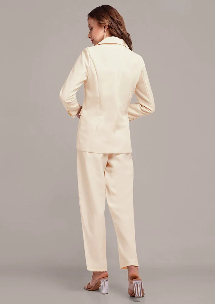 Oversized Off White blazer and pant set with golden buttons