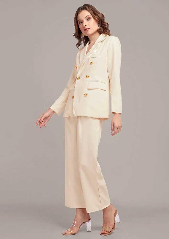 Oversized Off White blazer and pant set with golden buttons